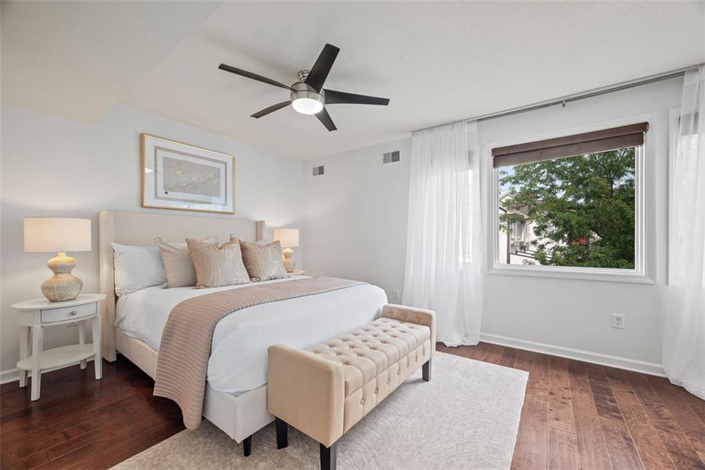 7 Waterside Place Pittsburgh, PA 15222 - Photo 17 of 43 a bedroom with a large bed and a window