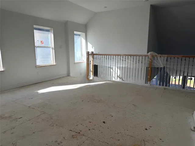 a view of a porch with a floor to ceiling window
