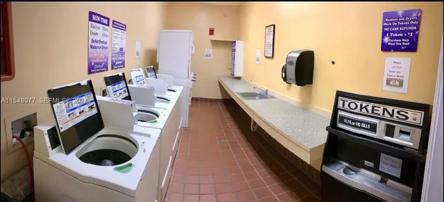 a view of living room with furniture and flat screen tv