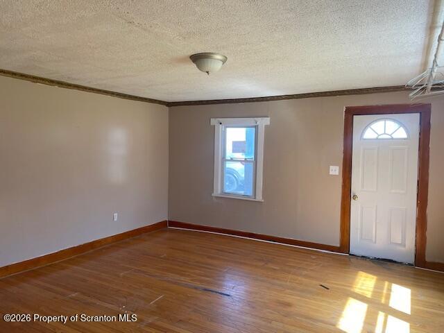 210 Crane Street Scranton, PA 18505 - Photo 11 of 17 a view of an empty room with wooden floor and a window