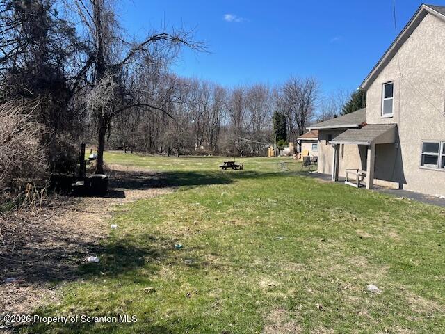 210 Crane Street Scranton, PA 18505 - Photo 16 of 17 a view of a house with a yard