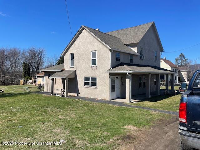 210 Crane Street Scranton, PA 18505 - Photo 2 of 17 a front view of a house with a yard