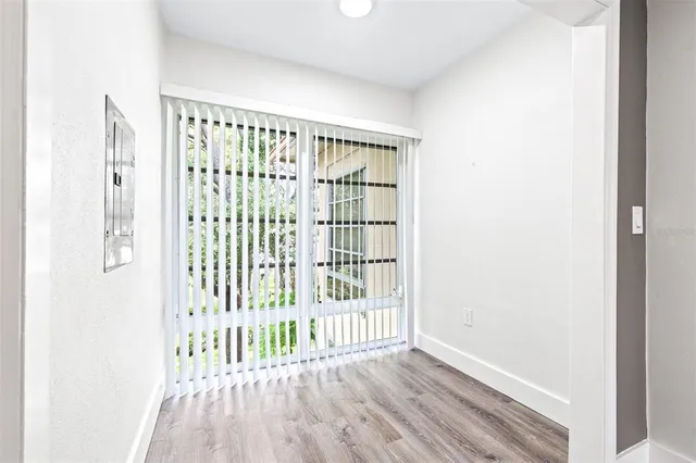 a view of entryway with wooden floor