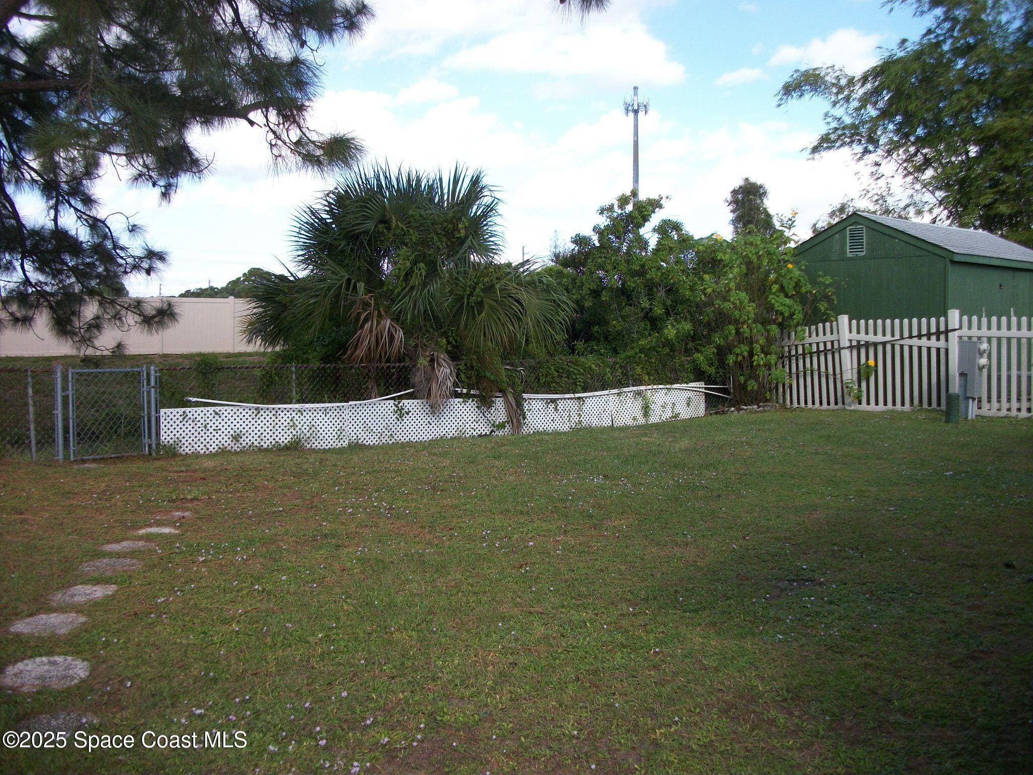 1972 Mango Street Northeast Palm Bay, FL 32905 - Photo 28 of 41 a view of outdoor space and yard