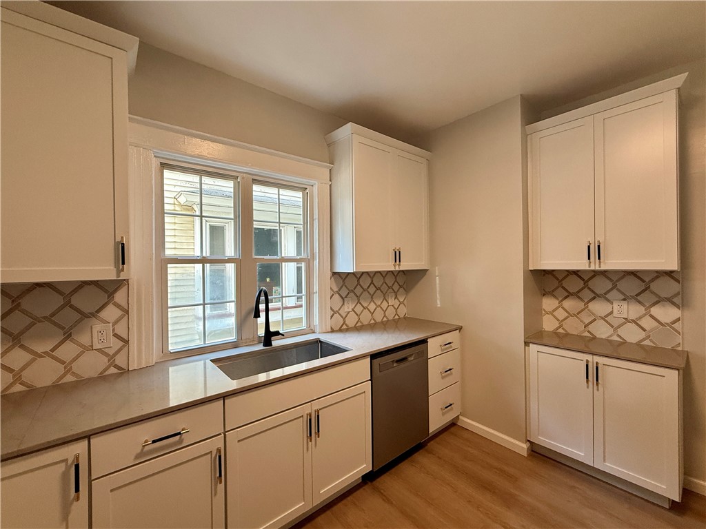 171 Cedarwood Terrace Rochester, NY 14609 - Photo 7 of 29 Let's check out the new kitchen.