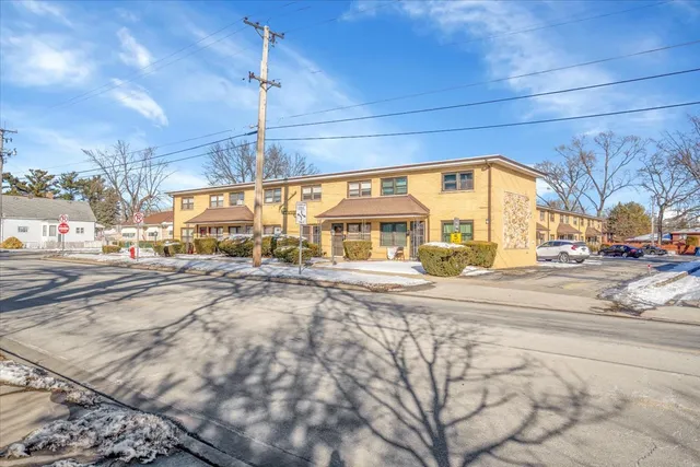 a view of a building with a street