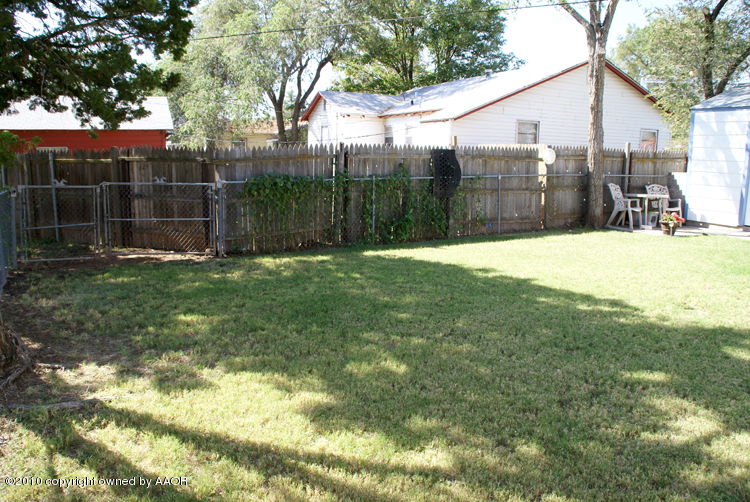 1615 Southwest 48th Avenue Amarillo, TX 79110 - Photo 9 of 14 a view of a backyard