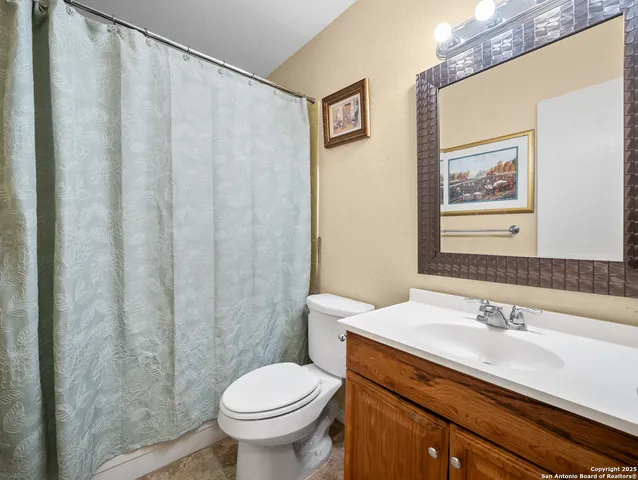 a bathroom with a sink and a toilet
