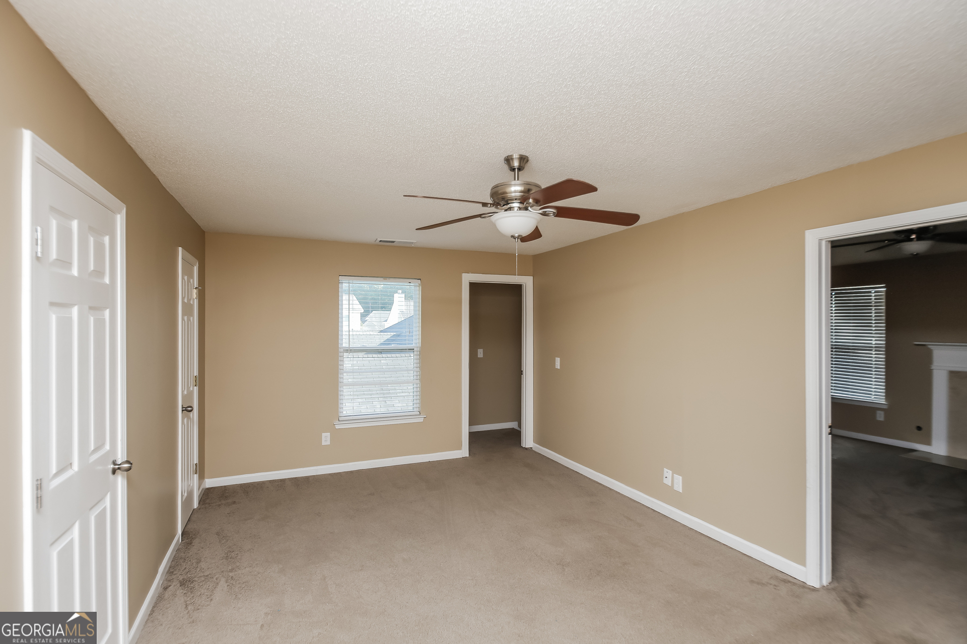 2002 Reflective Waters Road Villa Rica, GA 30180 - Photo 11 of 17 a view of an empty room with a window