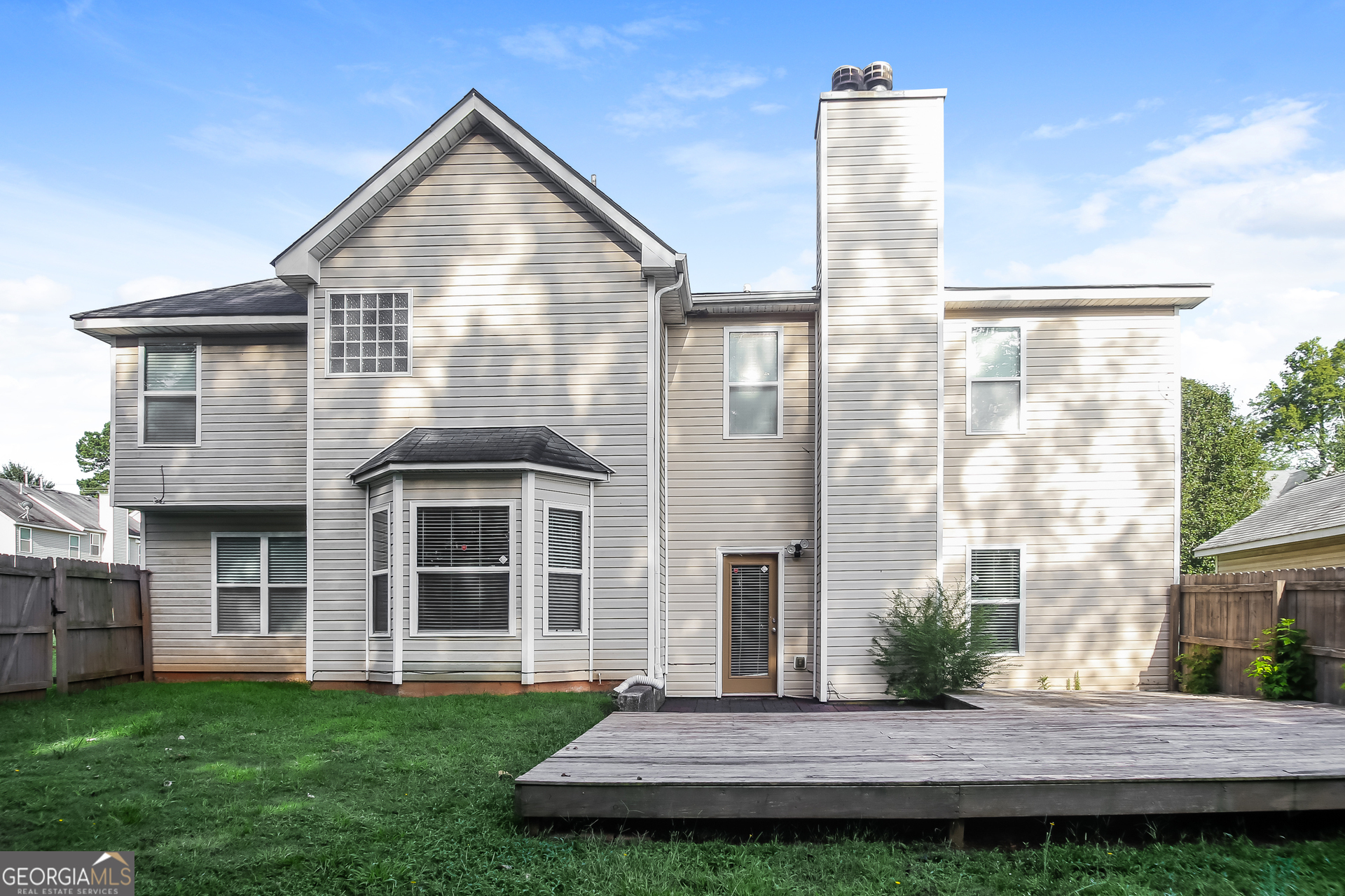 2002 Reflective Waters Road Villa Rica, GA 30180 - Photo 15 of 17 a front view of a house with a yard