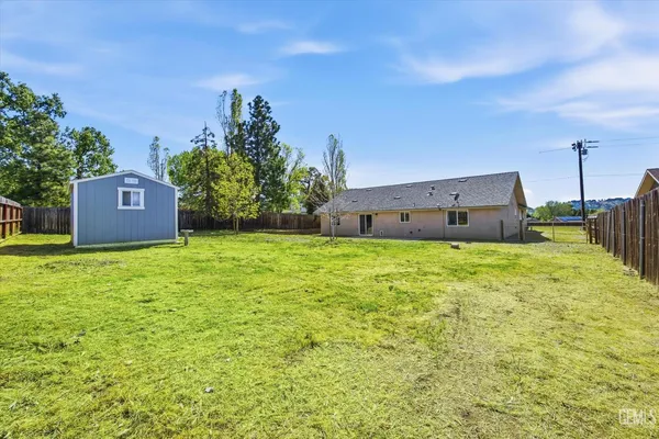 a house view with a garden space