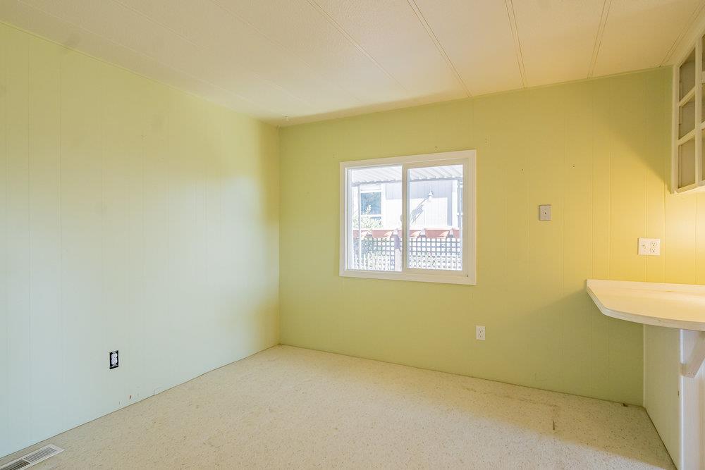 270 Hames Road, Unit 76 Corralitos, CA 95076 - Photo 13 of 23 an empty room with a empty space and a window