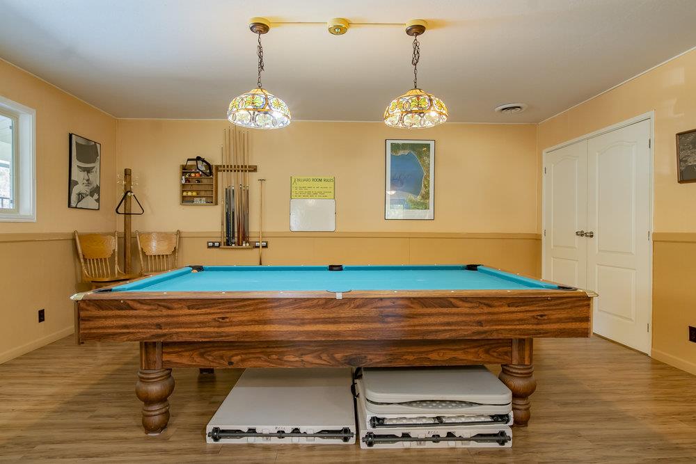 270 Hames Road, Unit 76 Corralitos, CA 95076 - Photo 22 of 23 a room with table chairs and wooden floor