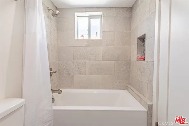 a bathroom with a bathtub
