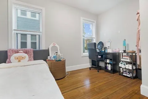 a kitchen with stainless steel appliances a refrigerator stove and microwave