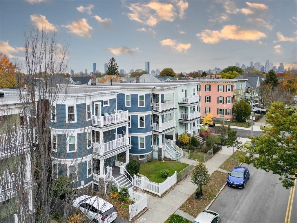 25 Pleasant Street Boston, MA 02125 - Photo 2 of 32 a view of a patio with swimming pool and furniture