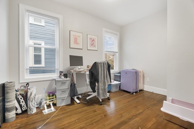25 Pleasant Street Boston, MA 02125 - Photo 29 of 32 a view of workspace with wooden floor windows