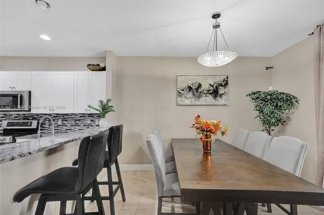 a view of a dining room and furniture