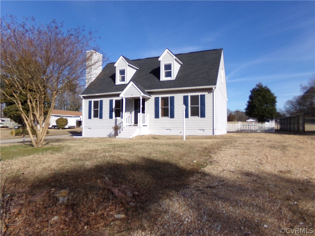 913 Perrymont Road Hopewell, VA 23860 - Photo 1 of 23 a front view of a house with a yard