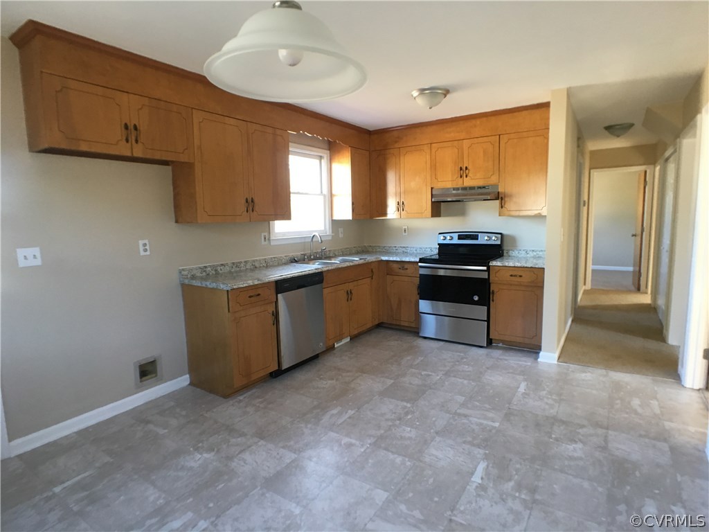 913 Perrymont Road Hopewell, VA 23860 - Photo 14 of 23 a kitchen with stainless steel appliances granite countertop a stove top oven a sink and dishwasher