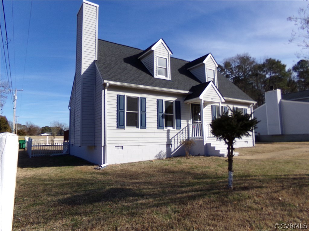 913 Perrymont Road Hopewell, VA 23860 - Photo 2 of 23 a front view of a house with a yard