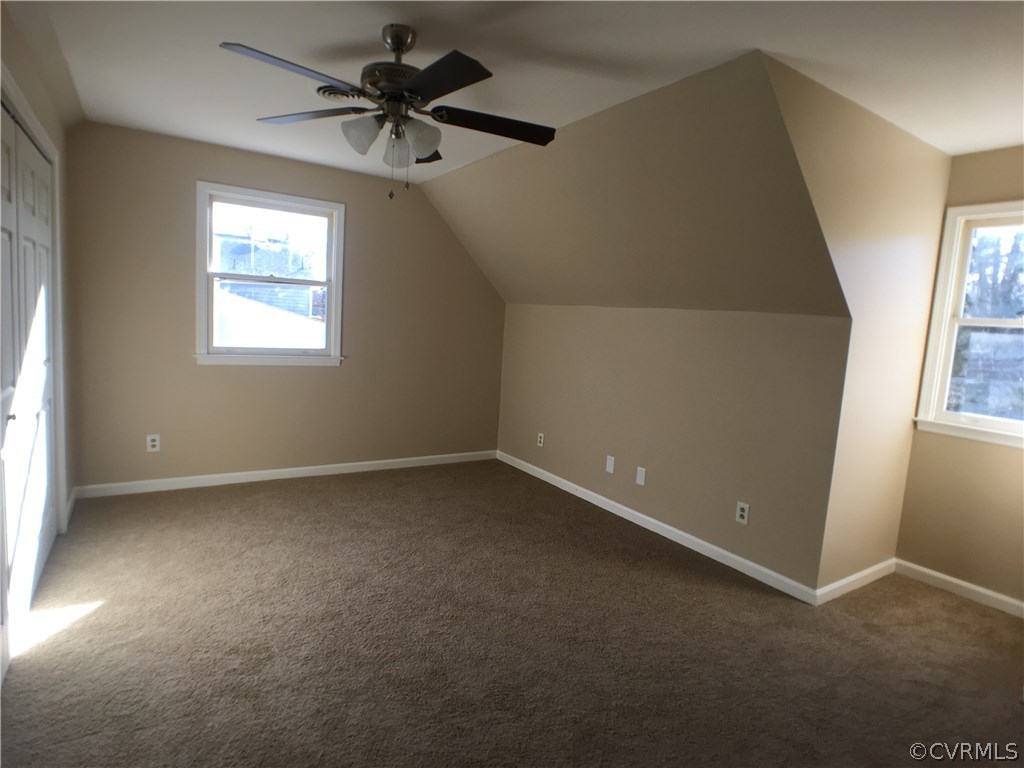 913 Perrymont Road Hopewell, VA 23860 - Photo 21 of 23 an empty room with windows and fan