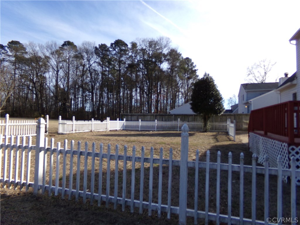 913 Perrymont Road Hopewell, VA 23860 - Photo 4 of 23 a view of backyard with a trees