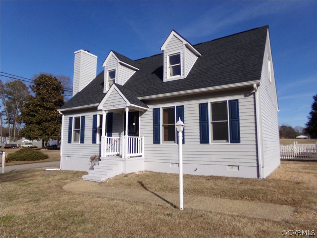 913 Perrymont Road Hopewell, VA 23860 - Photo 7 of 23 a front view of a house with a yard