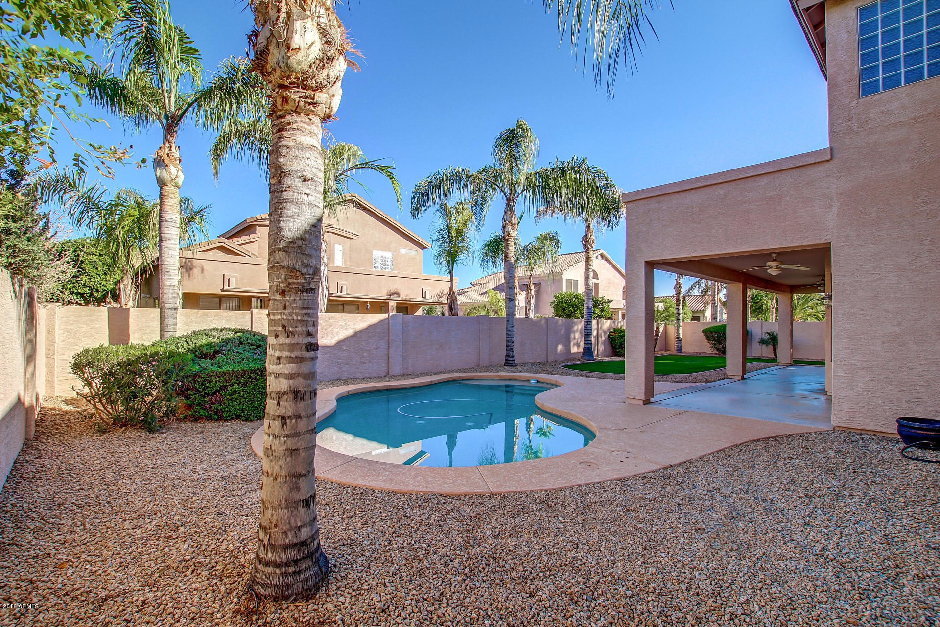 1360 East Harrison Street Gilbert, AZ 85295 - Photo 33 of 34 a view of a house with backyard and sitting area