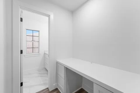 a view of an empty walk in closet