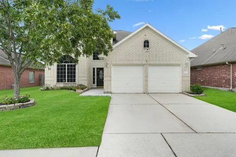 a front view of house with yard