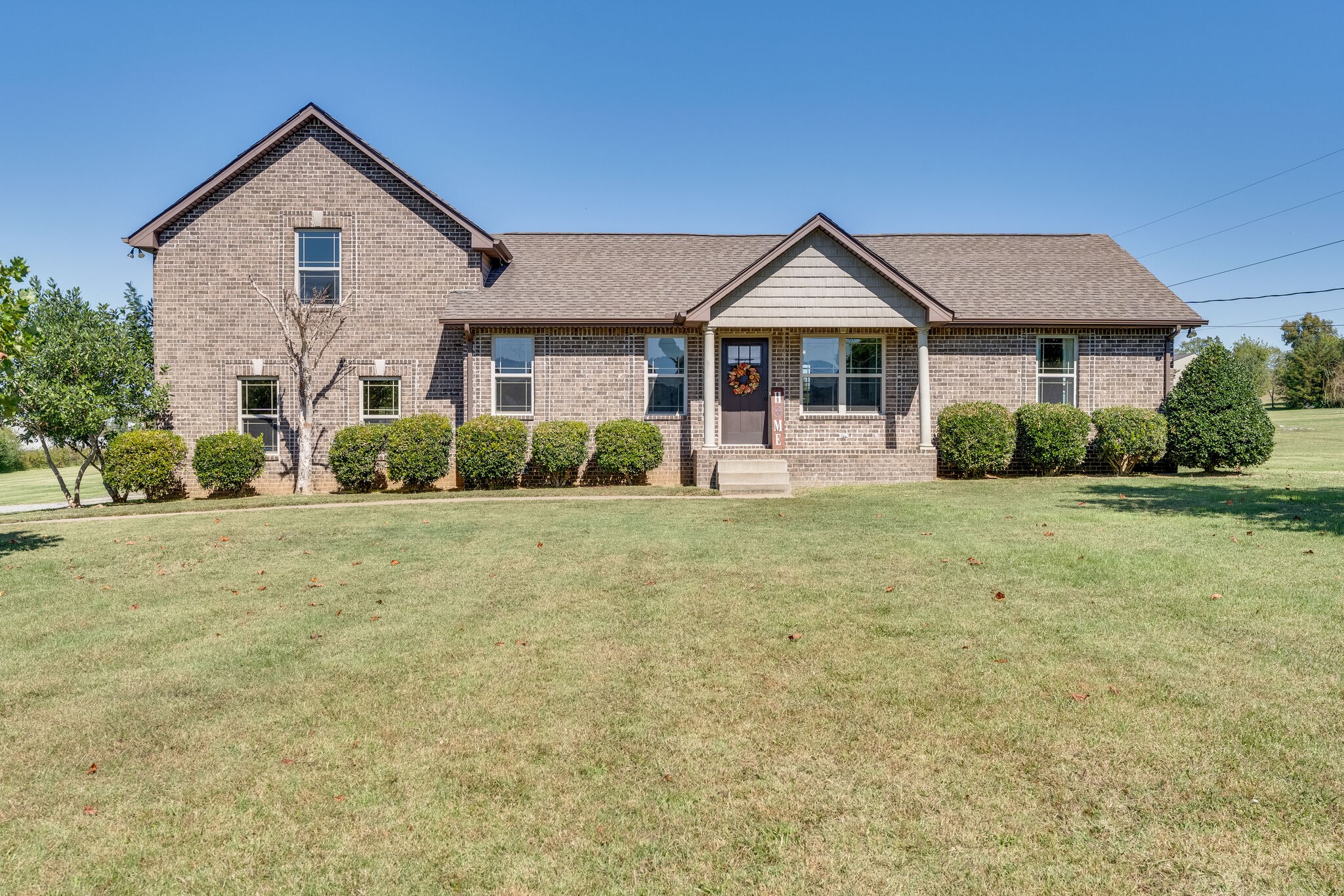515 Neal Road Watertown, TN 37184 - Photo 1 of 30 a front view of a house with garden
