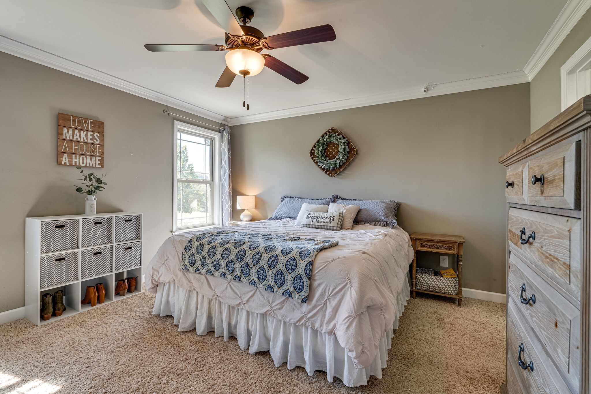 515 Neal Road Watertown, TN 37184 - Photo 15 of 30 a bedroom with a bed and a chandelier