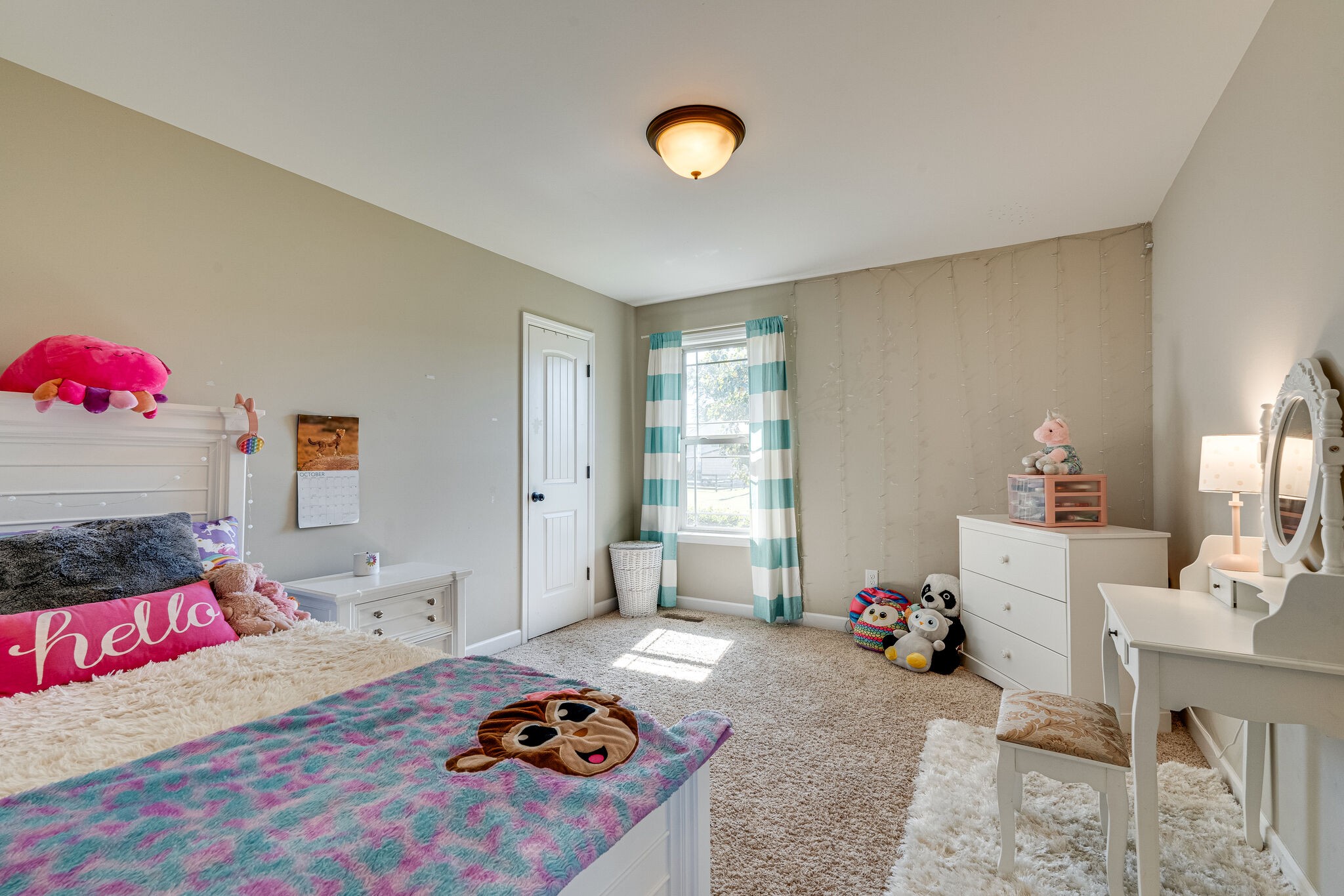 515 Neal Road Watertown, TN 37184 - Photo 18 of 30 a bedroom with a bed and a chandelier
