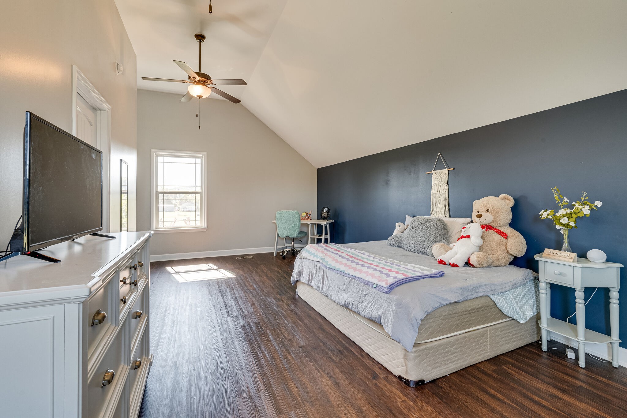 515 Neal Road Watertown, TN 37184 - Photo 23 of 30 a bedroom with a bed and a flat screen tv