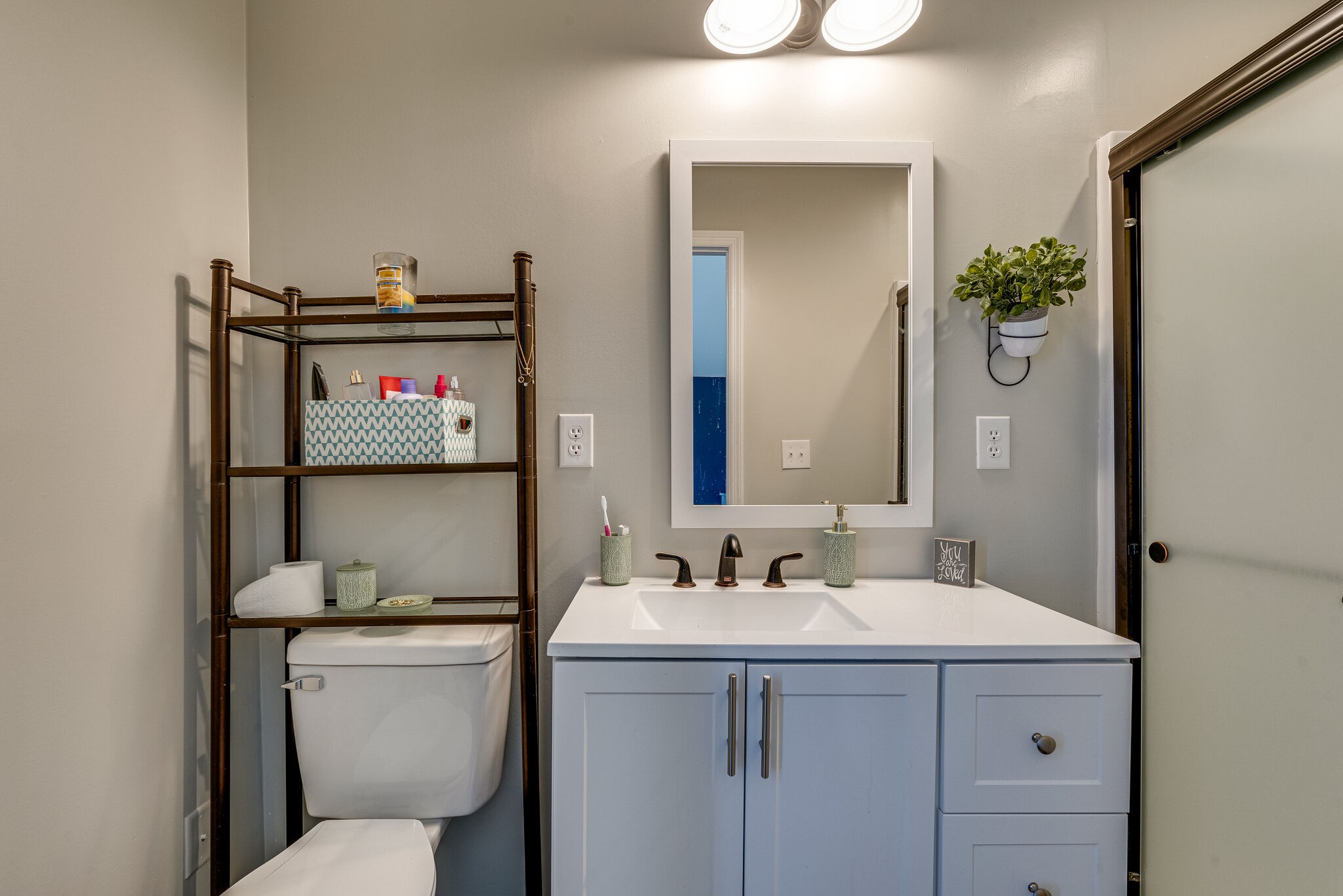 515 Neal Road Watertown, TN 37184 - Photo 25 of 30 a bathroom with a toilet sink and mirror