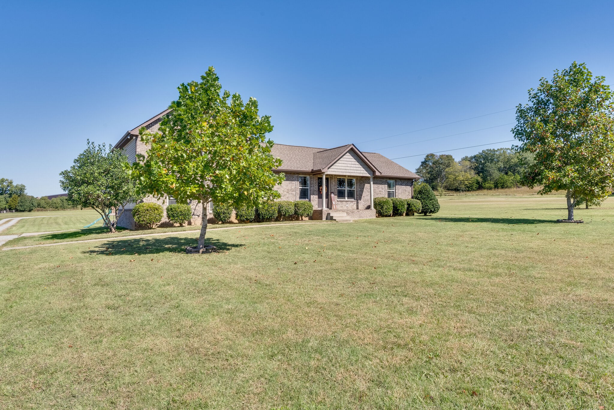 515 Neal Road Watertown, TN 37184 - Photo 5 of 30 a front view of a house with a yard