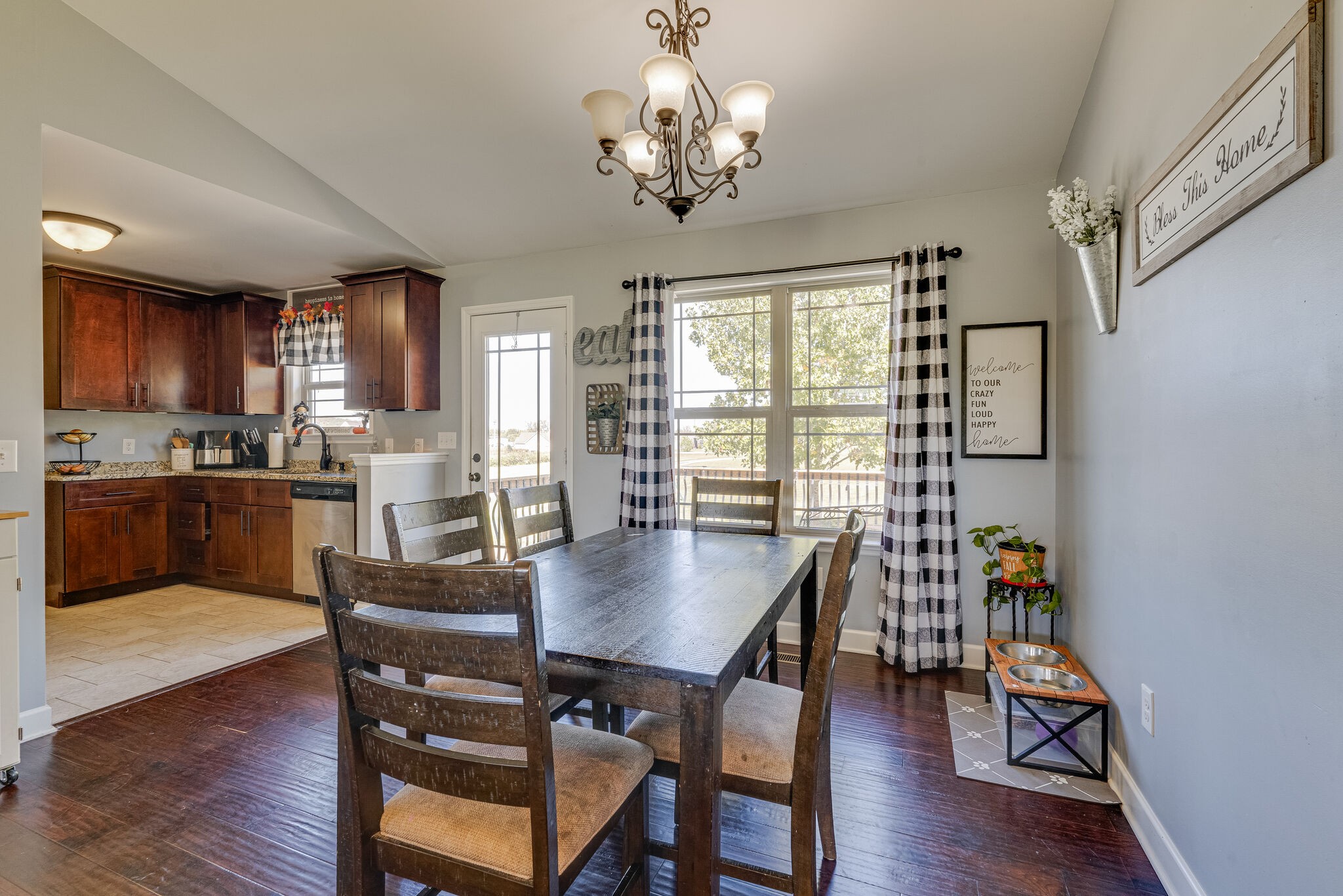 515 Neal Road Watertown, TN 37184 - Photo 10 of 30 a view of a dining room with furniture window and wooden floor