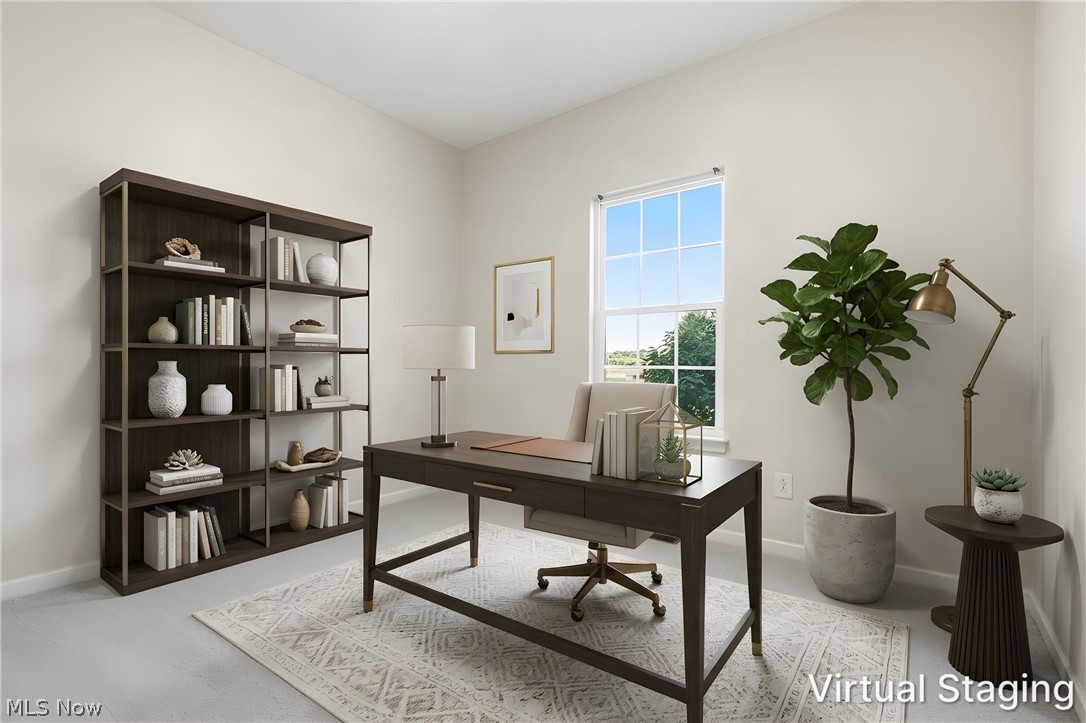 3280 Seven Bridges Road Medina, OH 44256 - Photo 20 of 41 Office space featuring light-toned walls, a multi-pane window, and wood-finish flooring with a decorative area rug