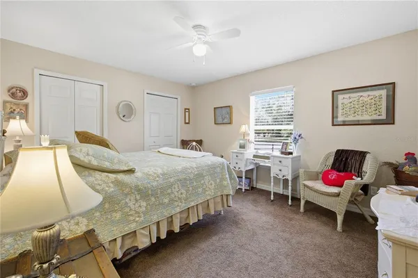 a bedroom with a bed and furniture