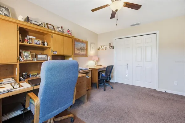 a view of a workspace with furniture