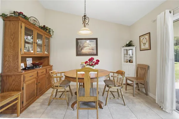 a view of a dining room with furniture