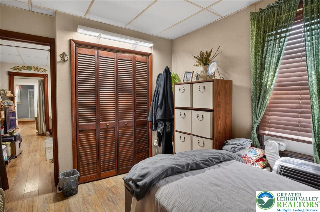 357 Main Road Lehighton, PA 18235 - Photo 13 of 38 a bedroom with a bed and a painting on the wall