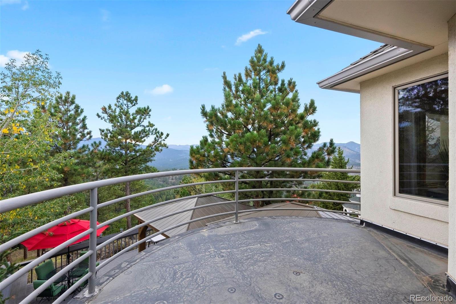 29115 Summit Ranch Drive Golden, CO 80401 - Photo 41 of 50 a view of outdoor space and deck