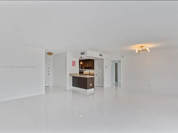 a view of room with window and outdoor view