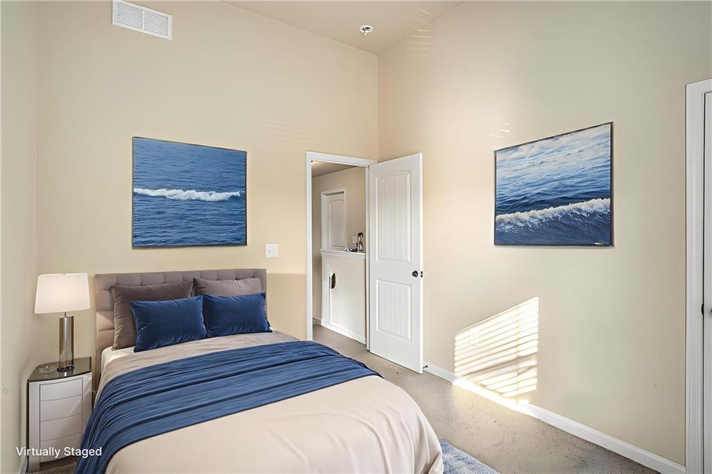 2277 Church Street Hampton, GA 30228 - Photo 24 of 30 a bedroom with a bed and a painting on the wall