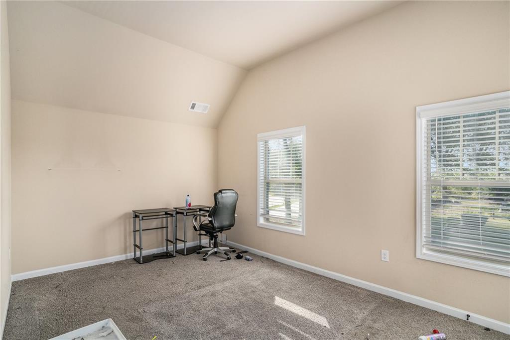 2277 Church Street Hampton, GA 30228 - Photo 25 of 30 a view of a workspace with a window