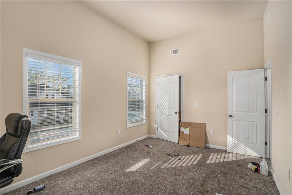 2277 Church Street Hampton, GA 30228 - Photo 26 of 30 a view of livingroom with furniture and windows