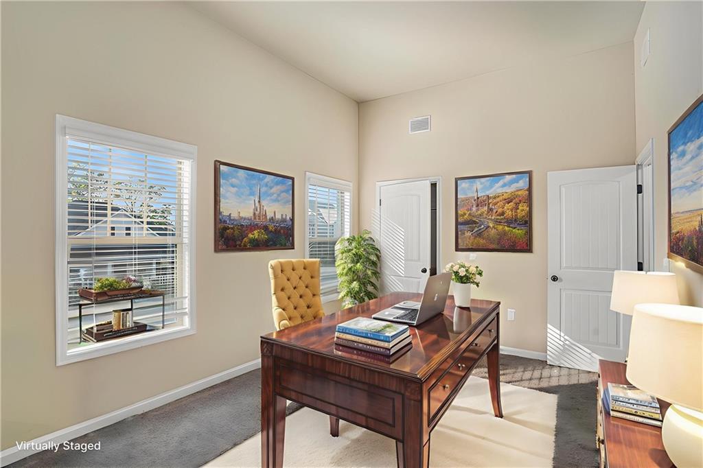 2277 Church Street Hampton, GA 30228 - Photo 27 of 30 a living room with furniture and a window