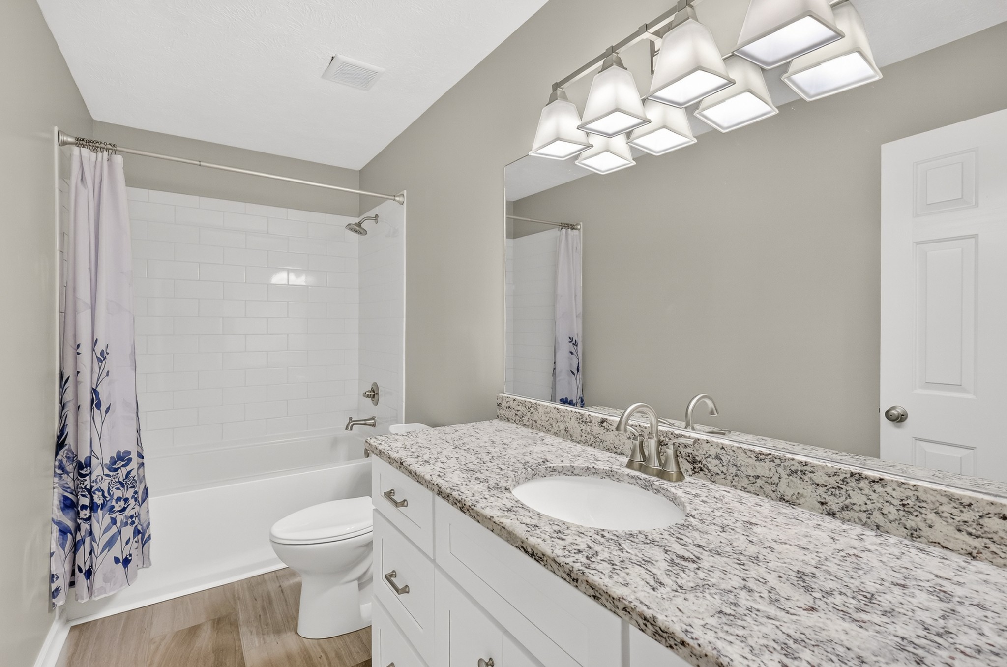 3145 Middleton Drive Rockvale, TN 37153 - Photo 14 of 50 a bathroom with a granite countertop sink a toilet and shower